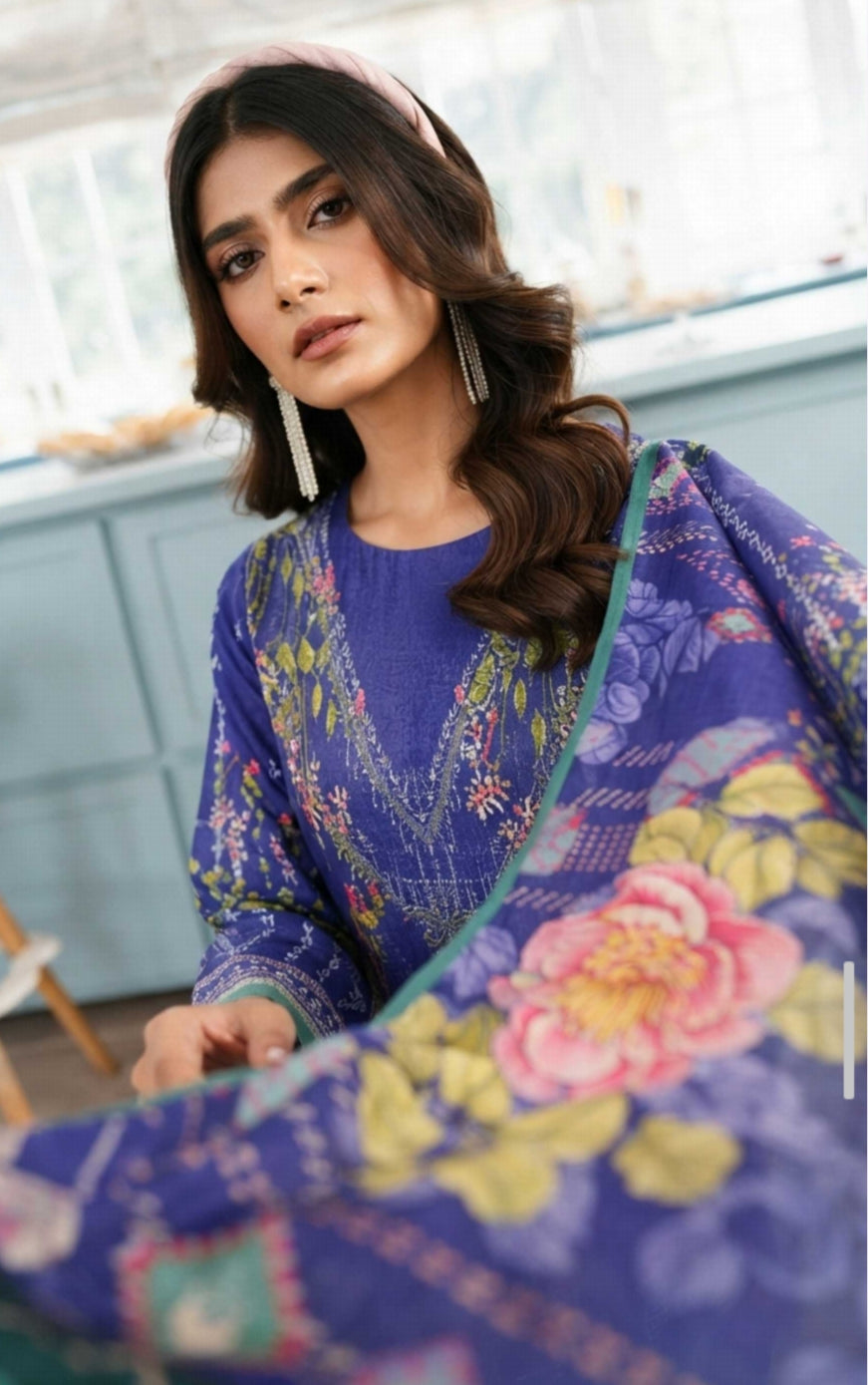 Noreya Loom Premium Royal Blue Floral Winter 3-Piece Printed Suit displayed on a mannequin, showcasing intricate floral patterns.