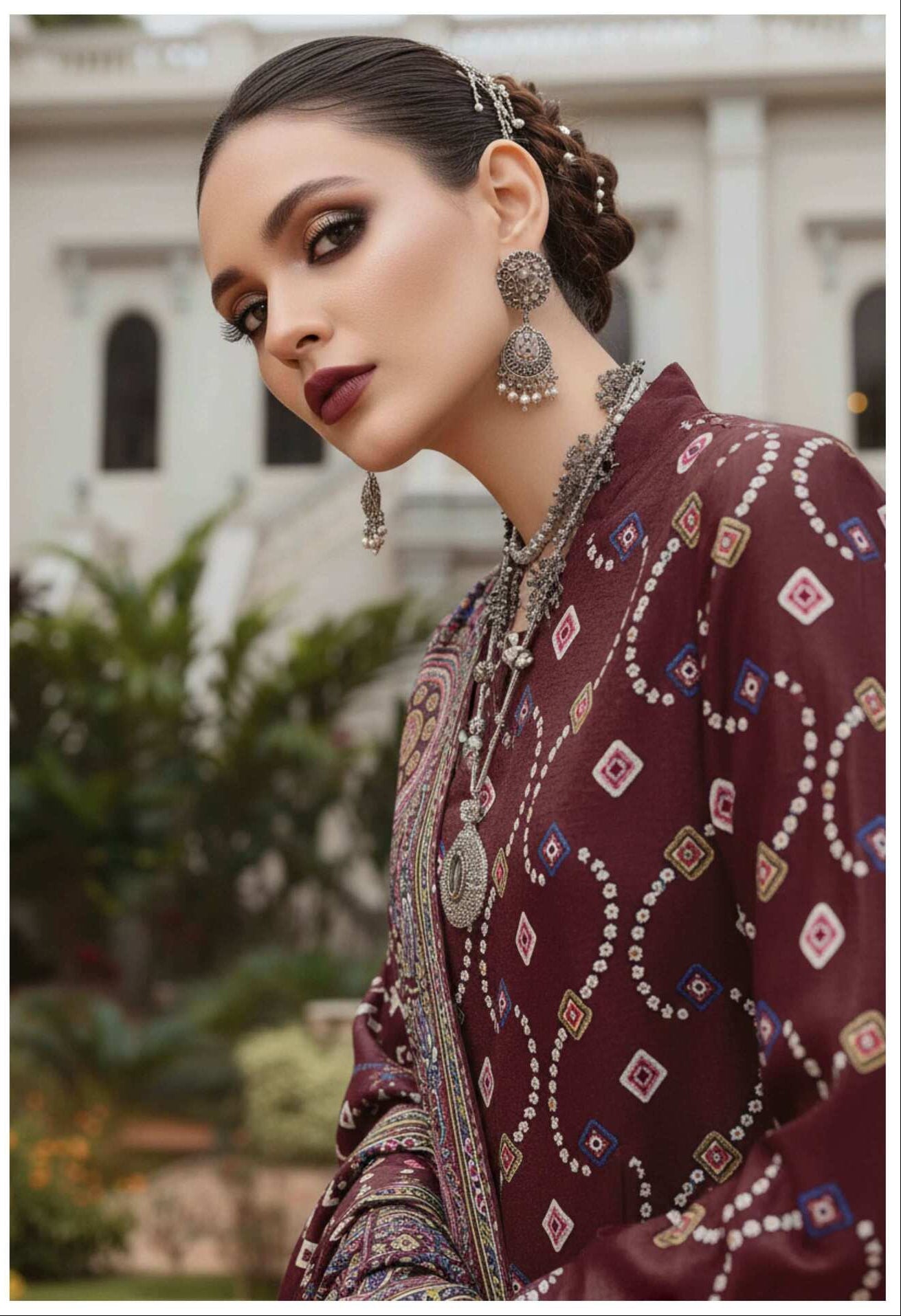 Burgundy Heritage 3-piece printed suit by My Store, featuring a tailored blazer, vest, and matching trousers on a hanger.