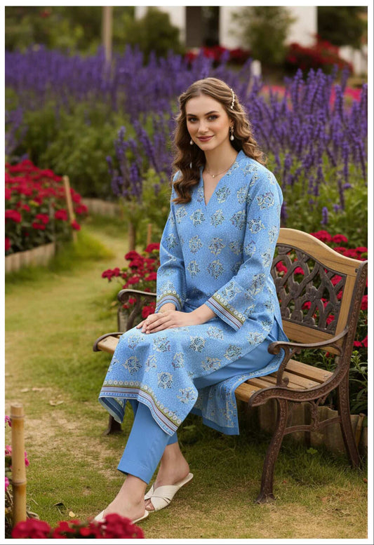 Sky blue Serenity 3-piece printed lawn suit with intricate design, featuring a kurta, dupatta, and matching pants.