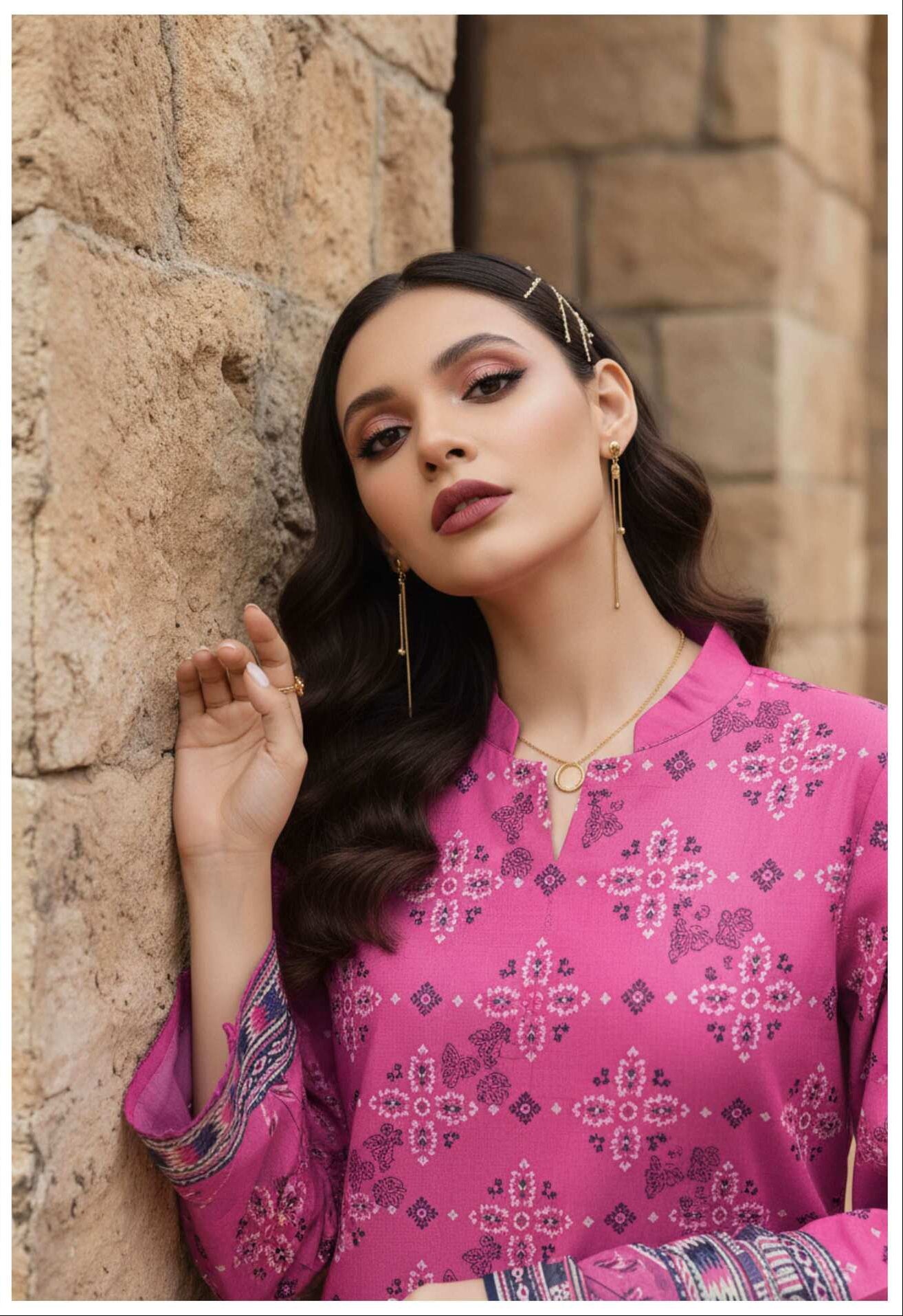 Hot pink floral printed 3-piece lawn suit with matching dupatta and trousers, featuring vibrant floral designs.