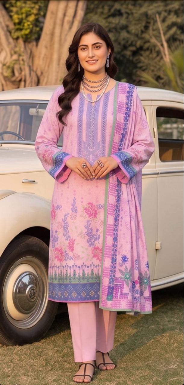 Pastel pink printed winter 3-piece suit by Noreya Loom, featuring a stylish coat, trousers, and matching top in a cozy winter collection.