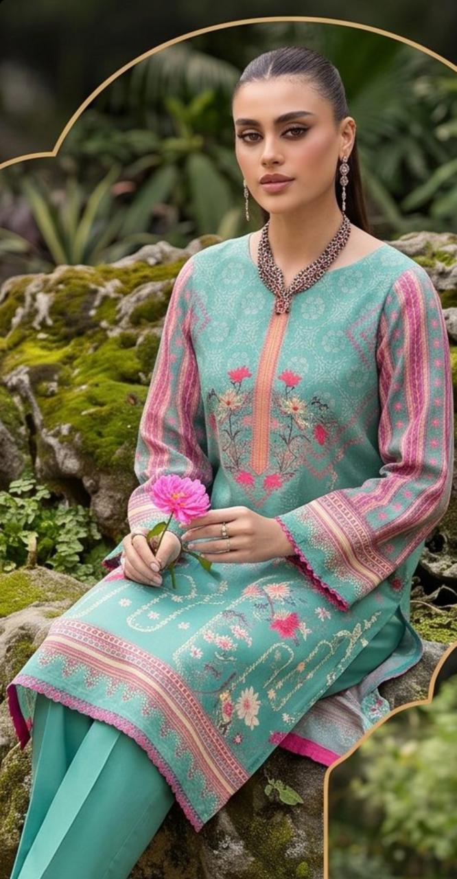 Elegant aqua floral 3-piece winter suit by Noreya Loom featuring mint-colored fabric and intricate floral embroidery.