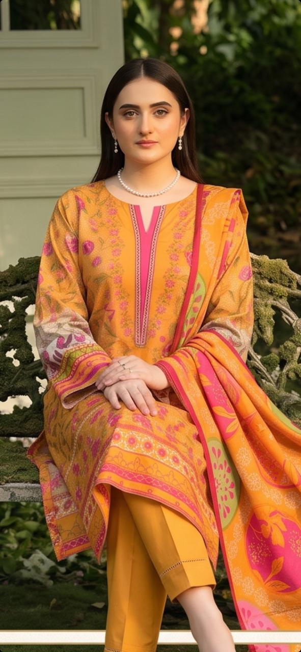 Women’s winter 3-piece printed suit by Noreya Loom, featuring a mustard and pink floral design with jacket, pants, and top.
