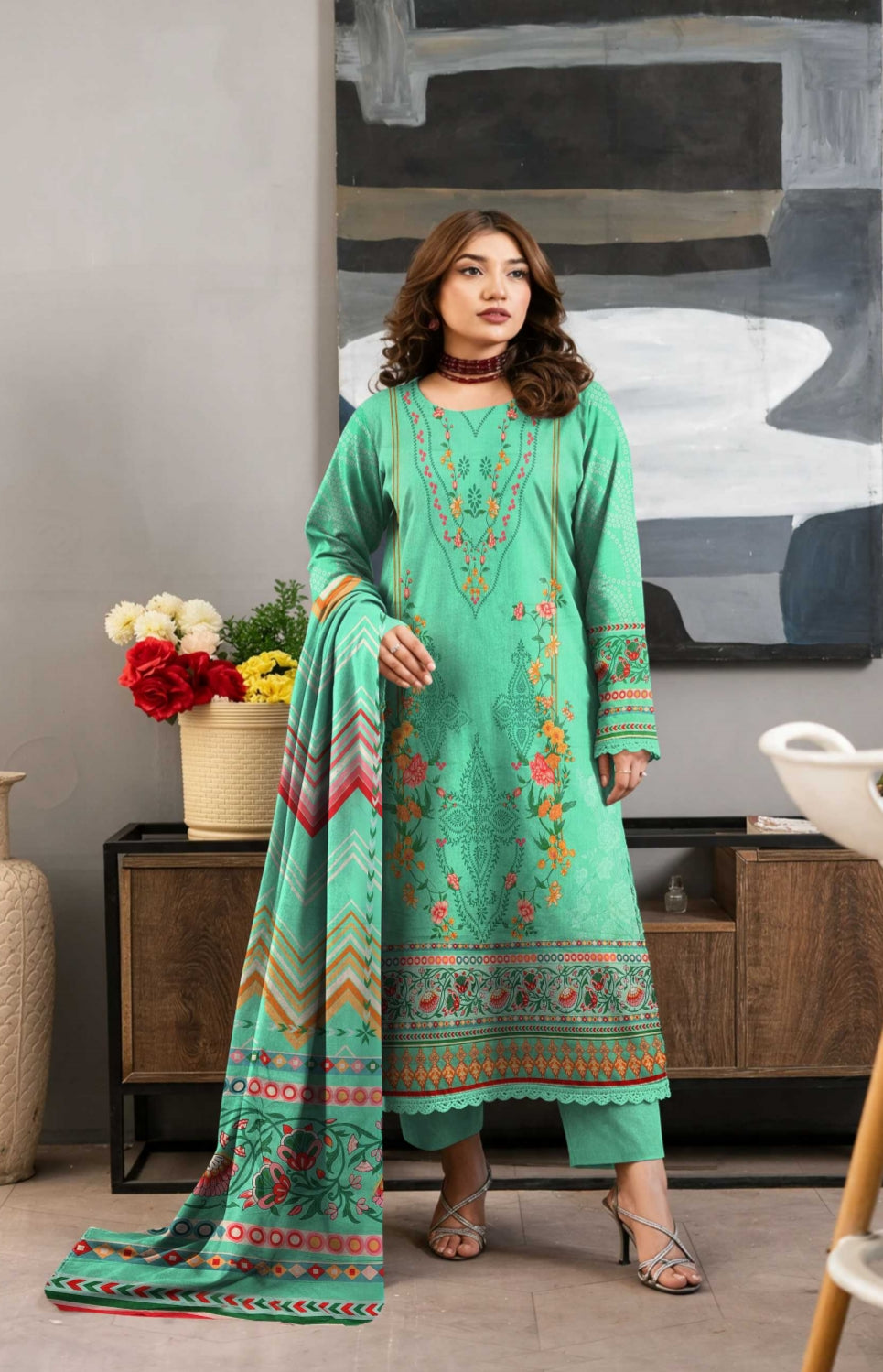 Premium mint green winter 3-piece embroidered lawn suit by Noreya Loom, featuring detailed embroidery and matching dupatta.