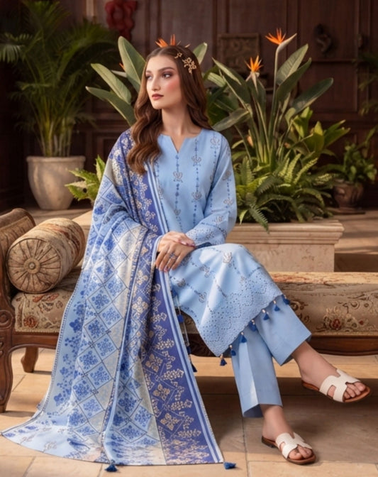 Elegant blue embroidered 3-piece lawn suit with printed dupatta by Noreya Loom, featuring intricate embroidery and vibrant fabric details.