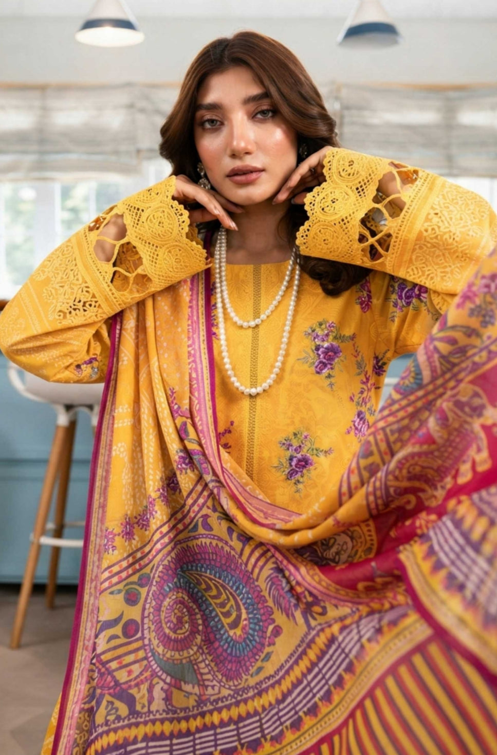 Yellow printed 3-piece winter suit by Noreya Loom, featuring intricate patterns and warm fabric for stylish winter wear.