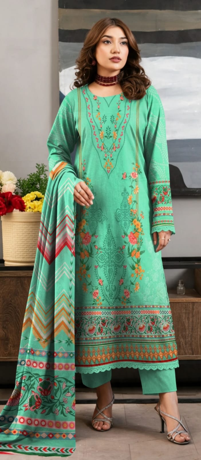 Premium mint green winter 3-piece embroidered lawn suit by Noreya Loom, featuring detailed embroidery and elegant fabric.