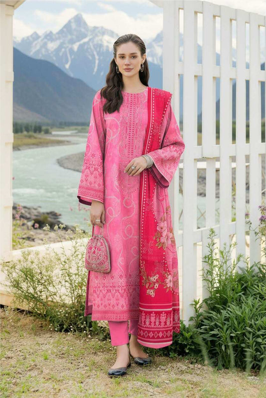 Rose pink printed 3-piece Pakistani lawn suit with intricate patterns, featuring a top, trousers, and dupatta.