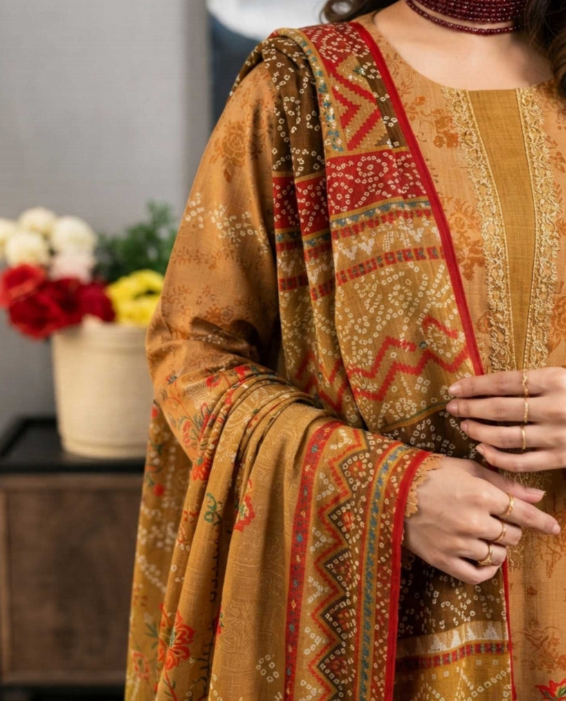 Heritage Mustard printed 3-piece winter suit by Noreya Loom, featuring traditional design and fabric details.