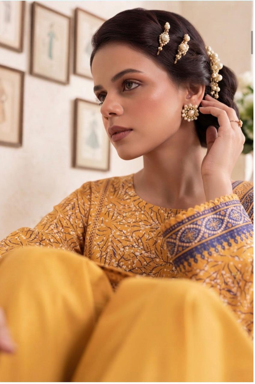 Noreya Loom Mustard Elegance printed 3-piece winter suit featuring a stylish mustard-colored top, pants, and matching shawl.