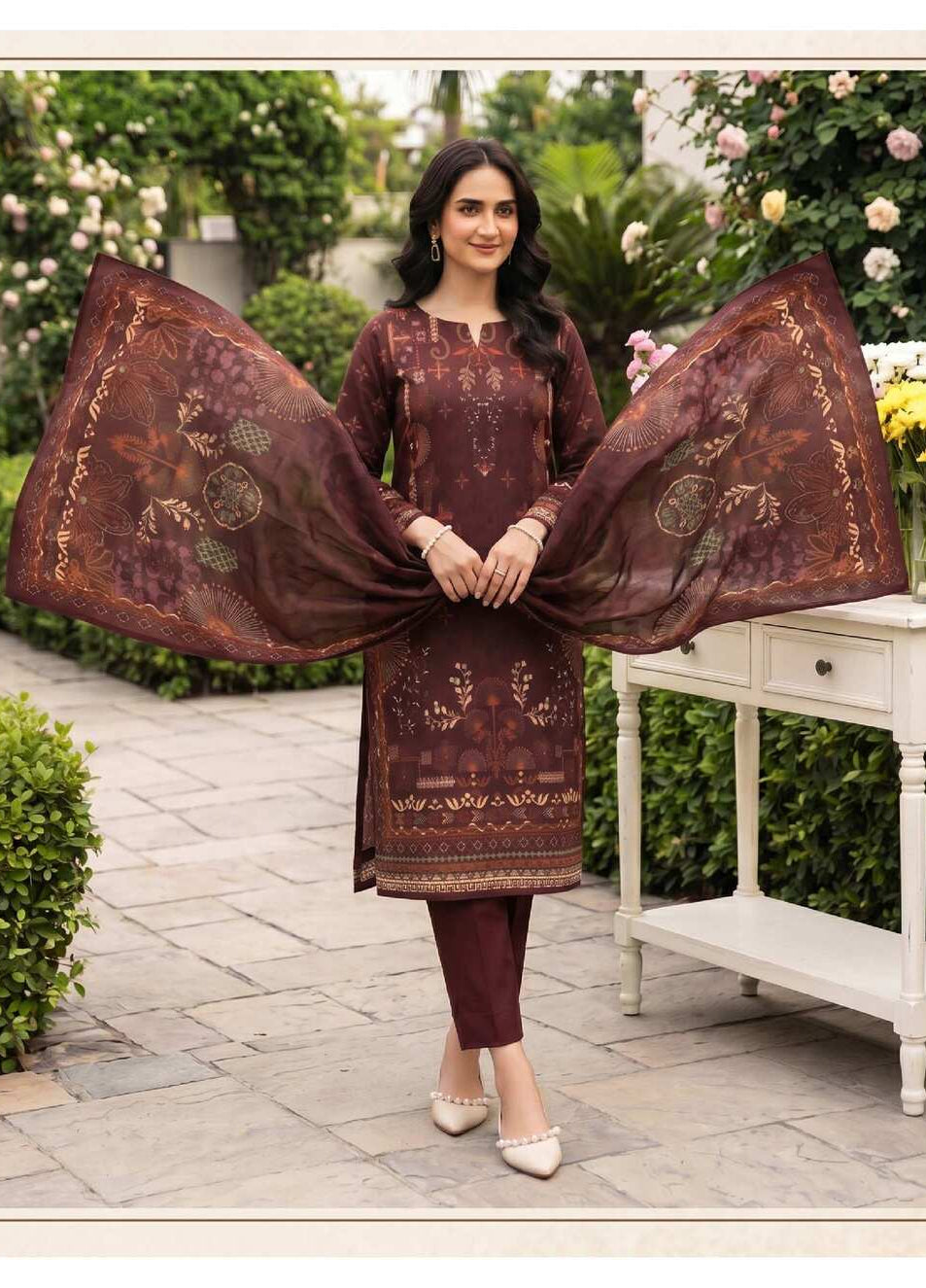 Elegant chocolate brown printed 3-piece lawn suit with floral dupatta, featuring intricate design and vibrant fabric details.