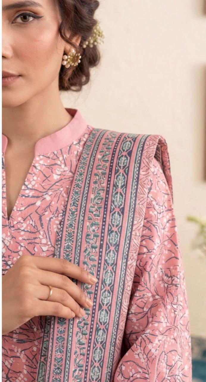 Blush pink floral printed 3-piece winter suit by Noreya Loom featuring a cozy coat, trousers, and matching scarf.