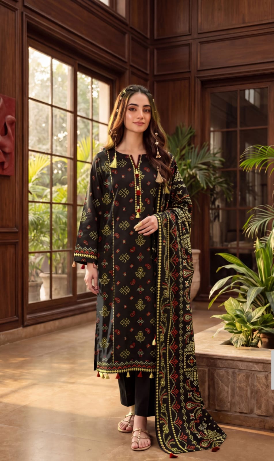 Noreya Loom Midnight Black Bandhani Print 3-Piece Winter Suit, featuring a black bandhani printed top, trousers, and dupatta.