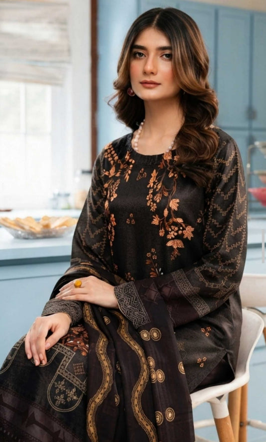 Noreya Loom black and rust floral printed winter 3-piece suit with a top, pants, and dupatta, featuring intricate floral patterns.