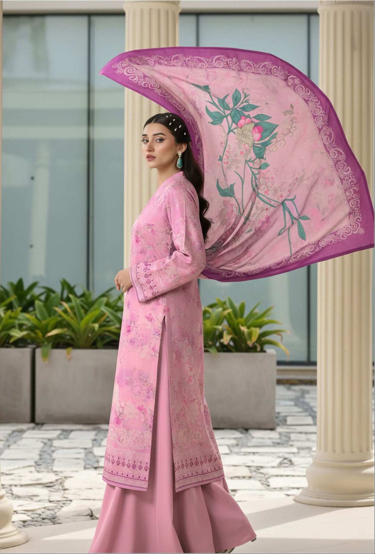 Elegant pink floral printed 3-piece Pakistani suit with intricate embroidery, featuring a matching dupatta and traditional design.