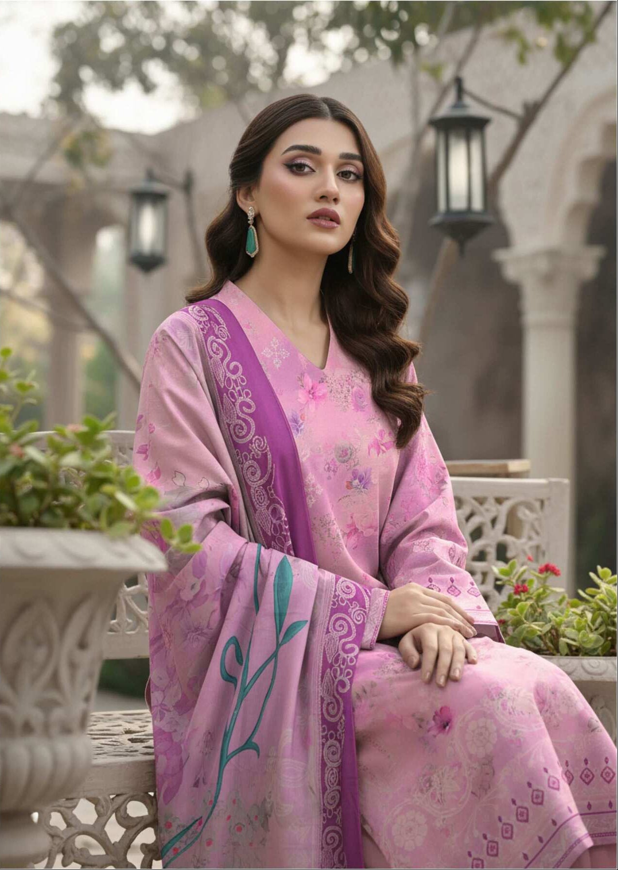 Elegant pink floral printed 3-piece Pakistani suit with intricate embroidery and matching dupatta, displayed on a mannequin.