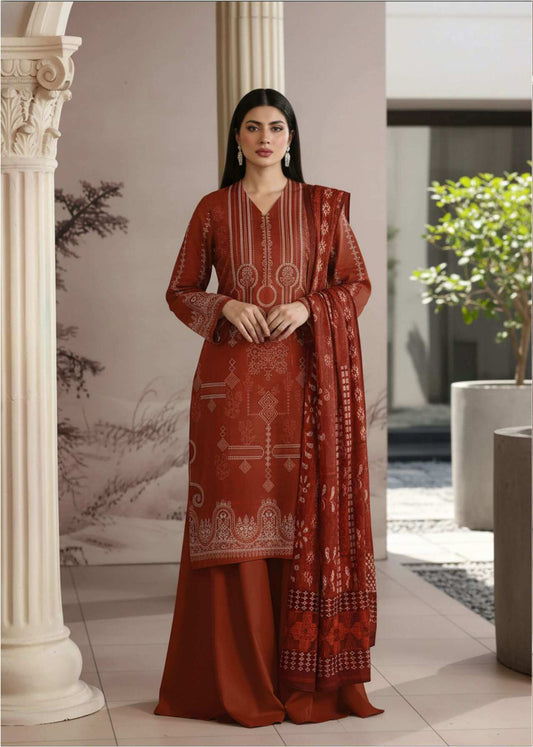 Rust brown embroidered 3-piece Pakistani suit with intricate designs, featuring a matching kurta, dupatta, and trousers.