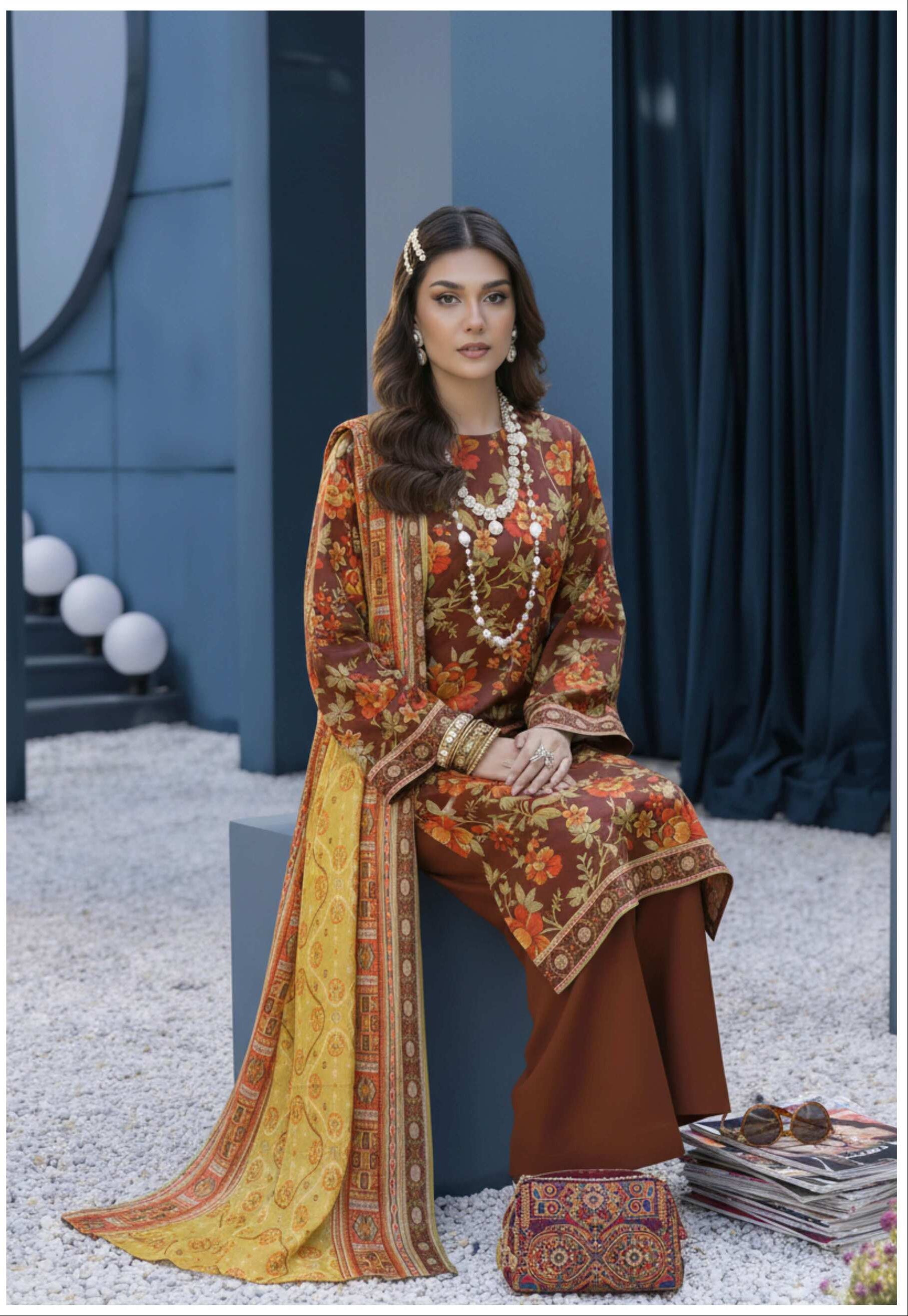 Maroon floral printed 3-piece suit with matching mustard printed dupatta, featuring intricate designs and traditional style.