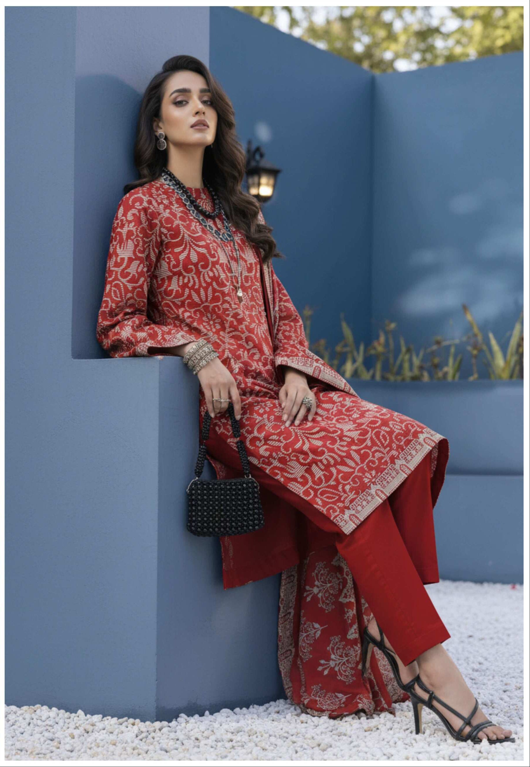 Elegant red printed 3-piece lawn suit with embroidered dupatta, showcasing detailed fabric and vibrant design by My Store.