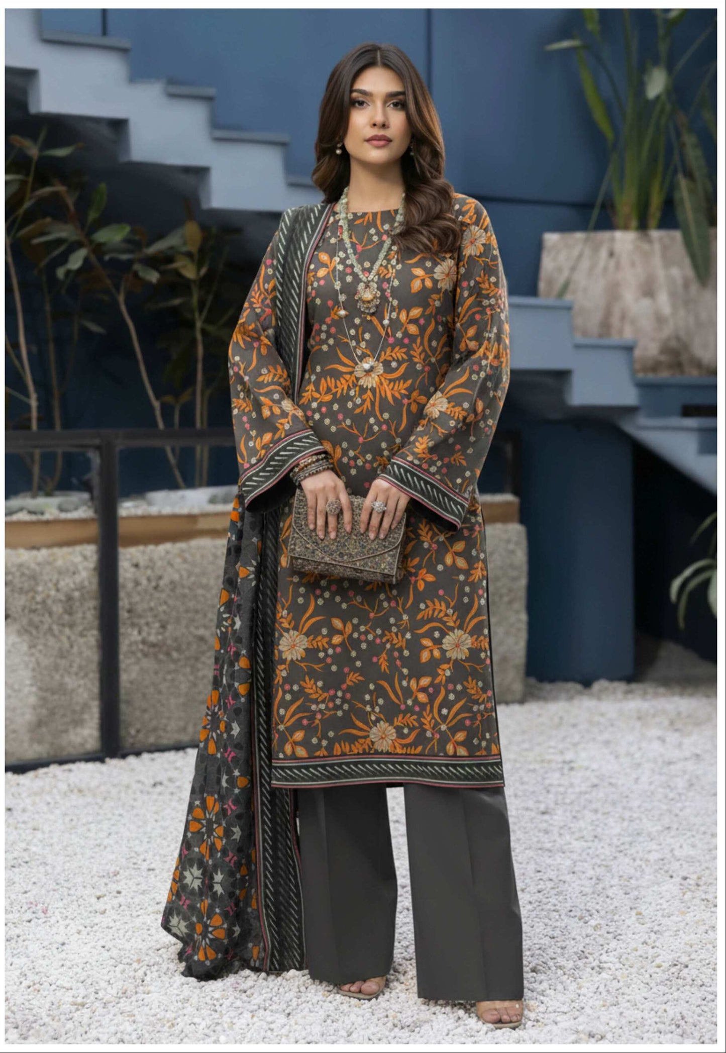 Elegant grey and orange floral printed 3-piece Pakistani suit with matching dupatta, stylish and traditional for festive occasions.