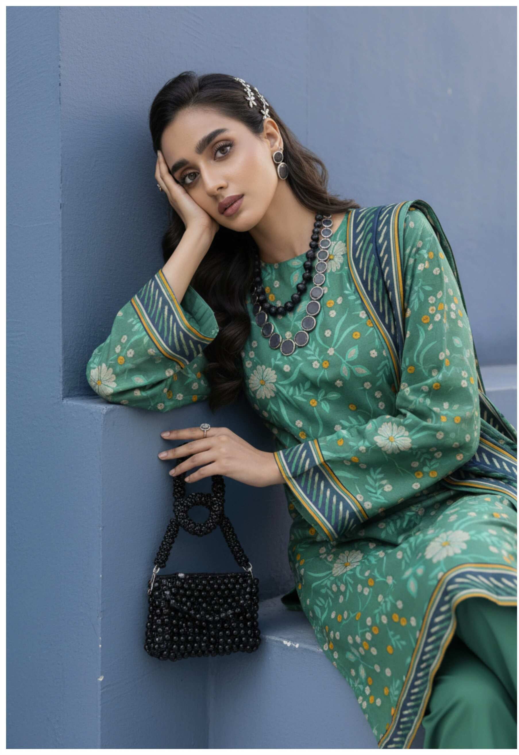 Sea green floral printed 3-piece lawn suit with matching dupatta, featuring elegant design and intricate detailing.