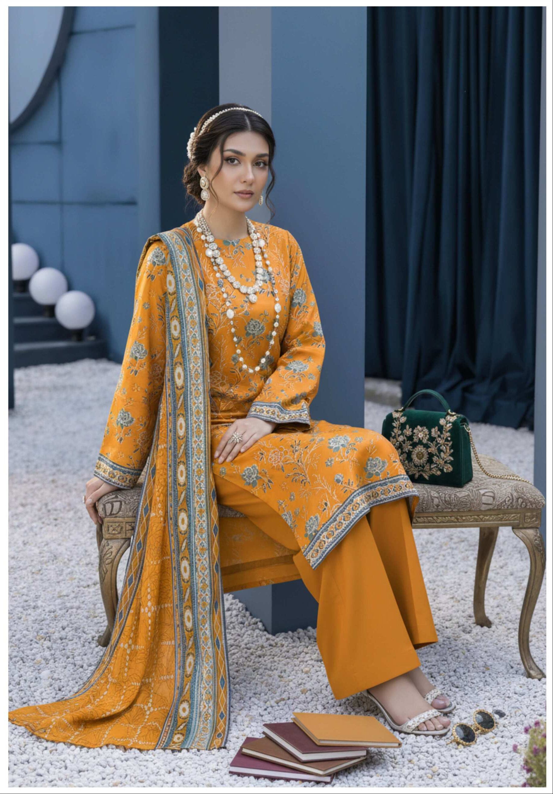 Mustard yellow floral printed 3-piece Pakistani suit with elegant design, featuring matching top, trousers, and dupatta.