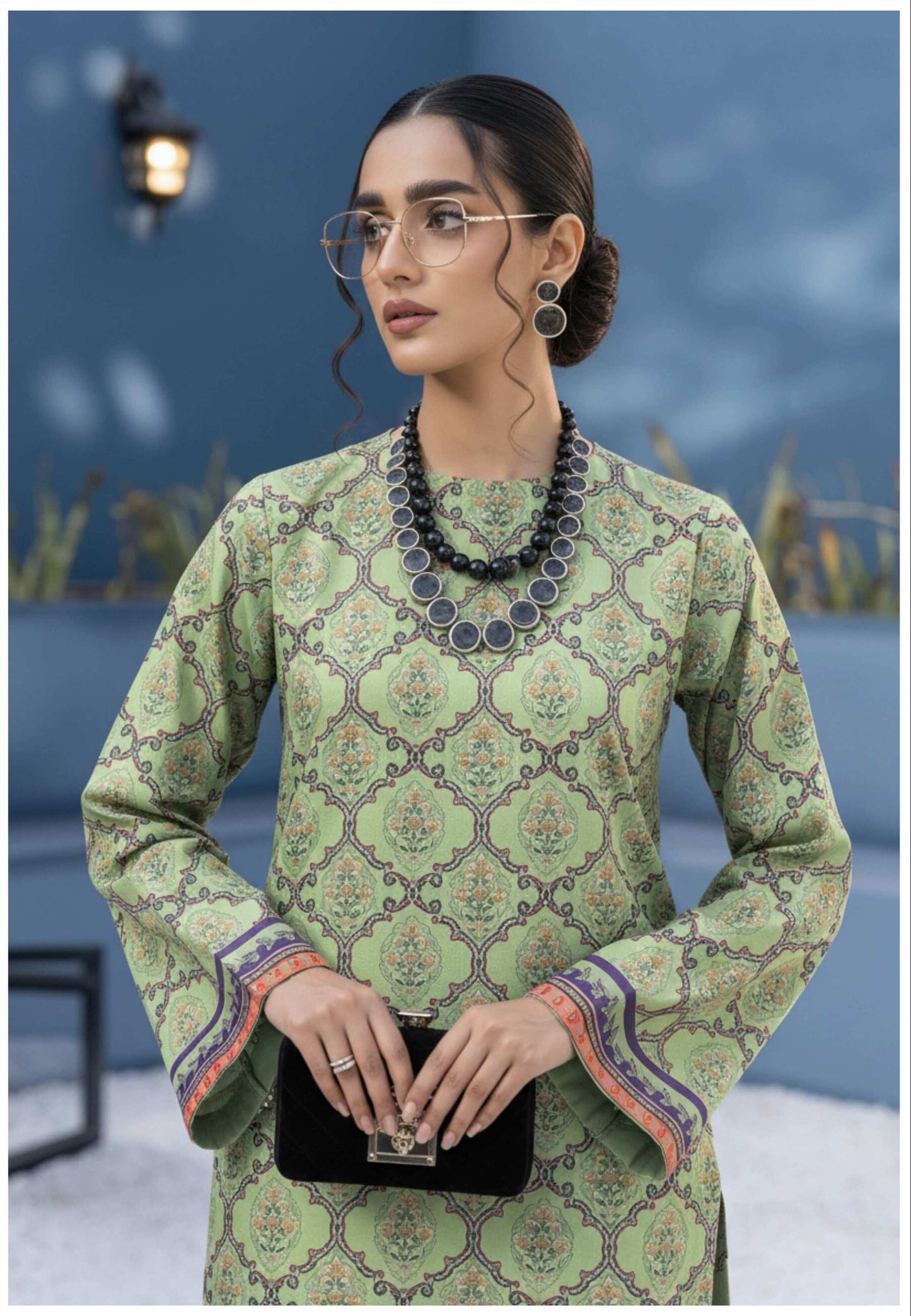 Elegant sage green printed 3-piece suit from the Pakistani collection, featuring traditional design and premium fabric details.